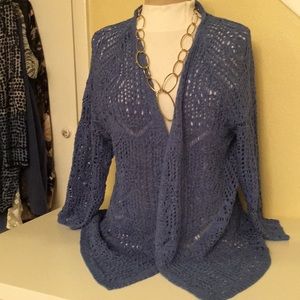 A beautiful crochê open sweater in sky blue color, 3/8 sleeve